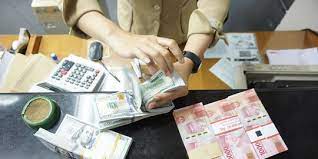 Ilustrasi BI Klaim Stabilitas Nilai Tukar Rupiah Tetap Terjaga. dok. Merdeka. BI Klaim Stabilitas Nilai Tukar Rupiah Tetap Terjaga, Lebih Baik dari Negara Lain!