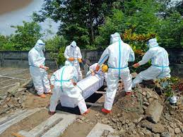 Covid-19 pemakaman pasien meninggal. dok. Wonogirikab.go.id. Pandemi Covid-19: Kasus Baru Infeksi Virus Corona Lima Hari Berturut-turut di Atas 3.000
