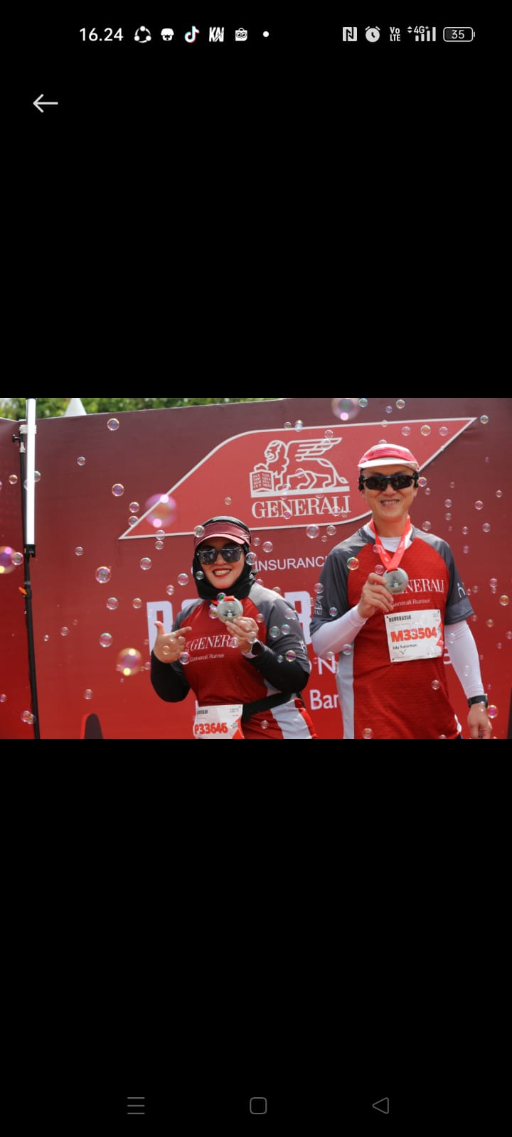 Chief Executive Officer PT Asuransi Jiwa Generali Indonesia Edy Tuhirman (kanan), bersama Chief Marketing Officer Vivin Arbianti saat turut hadir dan meramaikan Borobudur Marathon 2023 di Magelang, Jawa Tengah, Minggu (19/10/2023). dok. ist. Borobudur Marathon 2023, Generali Indonesia Lindungi 10 Ribu Pelari Lokal dan Mancanegara