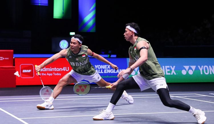 Fajar Alfian/Muhammad Rian Ardianto saat bertanding melawan Aaron Chia/Soh Wooi Yik (Malaysia) pada final All England 2024 di Utilita Arena, Birmingham, Inggris, Minggu (17/3/2024). (Dok. PBSI). Kompas. All England 2024, Titel Terbanyak Untuk Indonesia!