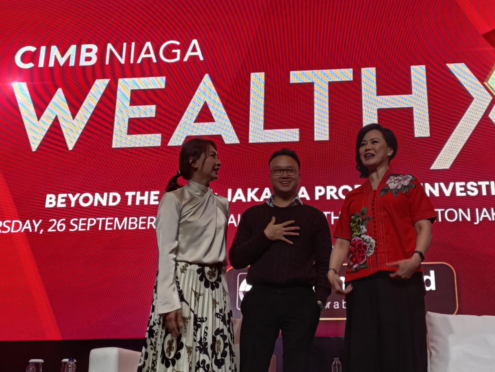 Consumer Banking Marketing Head CIMB Niaga Deffy Lisa Hardjono (kanan), Property Influencer Anthony Sudarsono (tengah)serta Asst. Vice President of Sinar Mas Land BSD Residential Andriany Sutanto (kiri) berbincang bersama dalam talkshow interaktif, salah satu dari rangkaian kegiatan yang tergabung dalam signature event CIMB Niaga, WEALTH XPO, yang mengusung tema besar Charting Indonesia's Economic Path: Transition & Growth, WEALTH XPO menghadirkan ahli terkemuka yang membahas dinamika dan strategi pertumbuhan ekonomi Indonesia dalam menghadapi tahun 2025 di Jakarta, Kamis (26/9/2024). dok.ist. HUT ke-69, CIMB Niaga Gelar Dua Event Akbar di Tiga Kota Besar