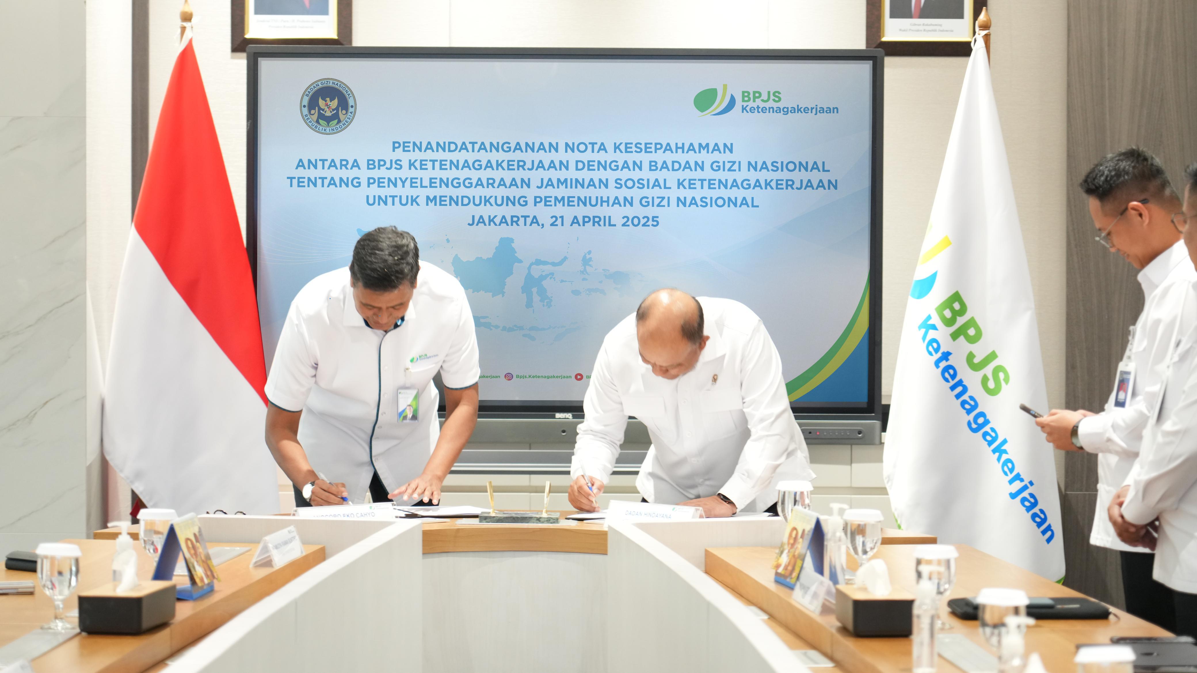 BPJS Ketenagakerjaan meneken kerja sama dengan badan gizi nasional dalam program makin bergizi gratis. FOTO - ISTIMEWA Komitmen! BPJS Ketenagakerjaan, dan BGN Lindungi Pekerja Ekosistem MBG