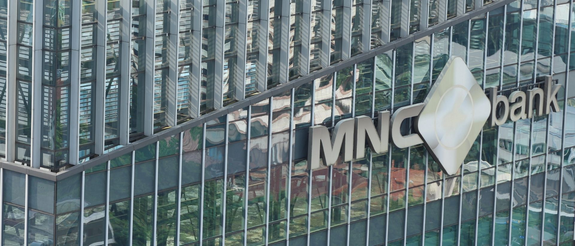 Logo MNC Bank bertengger di gedung MNC Tower, Kebon Sirih, Jakarta. FOTO - ISTIMEWA Laba Melesat 34 Persen, Kuartal I-2025 BABP Defisit Rp598 Miliar